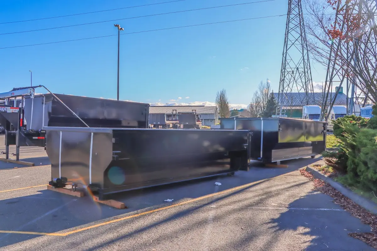 Roll-off dumpster ready for waste disposal at job site for Yard Waste Dumpster Rental in Navarre